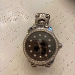 Tag Heuer woman’s link watch with diamonds